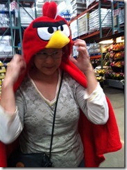 Trying on the Angry Bird blanket for size